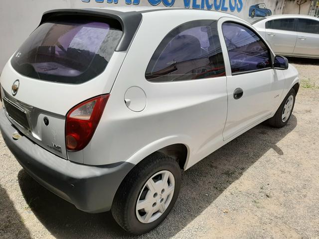 Celta 2009 com Ar $12.999 T. *