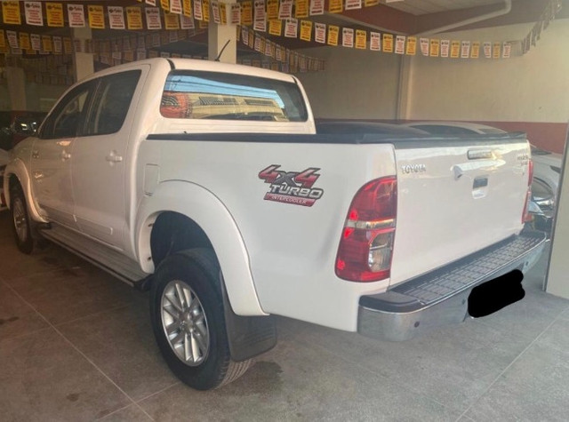 Hilux Srv AUT 3.0 4x4 2012/12 - Foto 11