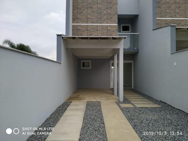 Sobrado geminado com 107 m² no Bairro Iririu - Foto 3