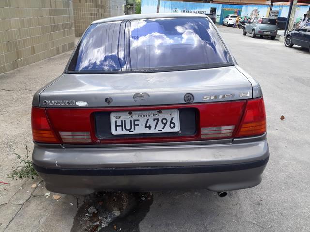 Suzuki 1993 completo 1.6 gasolina 4 portas - Foto 14