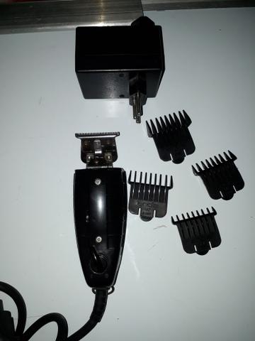 Máquina de cabelo (acabamentos) andis gtx.