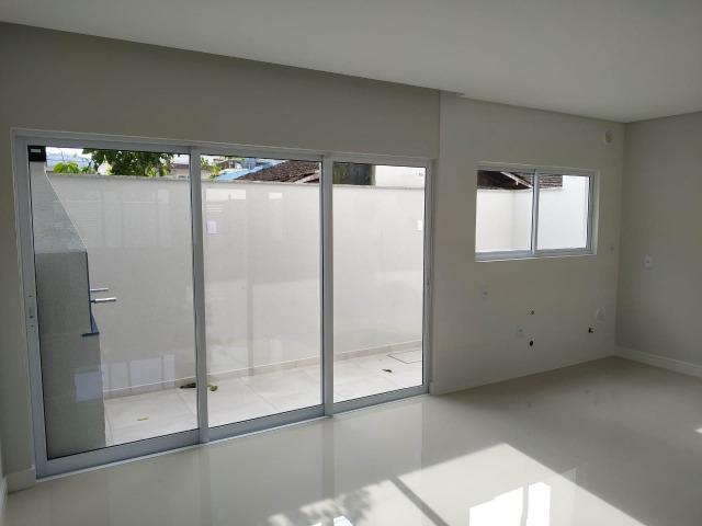Ótima casa geminada em Itapema -SC aproximadamente a 500 metros do mar - Foto 5