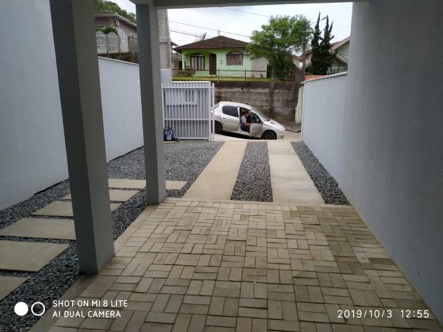 Sobrado geminado com 107 m² no Bairro Iririu - Foto 4