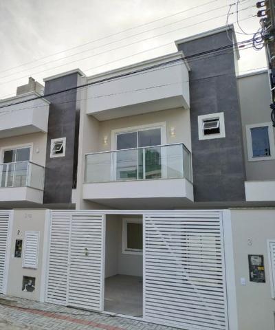 Ótima casa geminada em Itapema -SC aproximadamente a 500 metros do mar