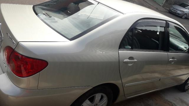 Vendo ou troco corolla seg - Foto 5