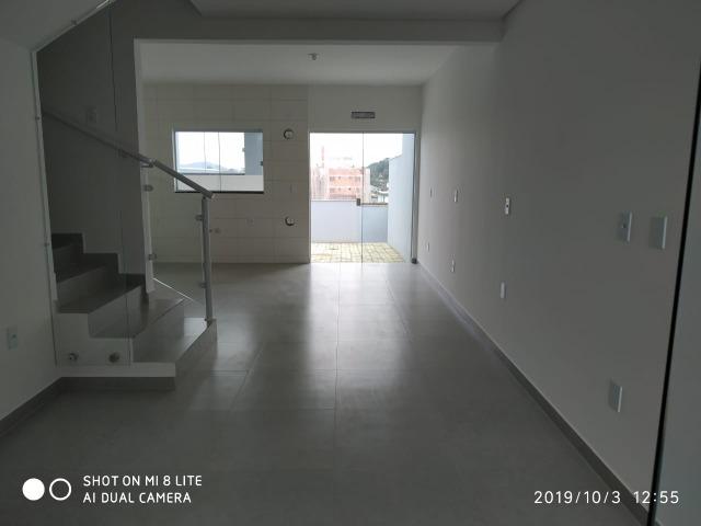Sobrado geminado com 107 m² no Bairro Iririu - Foto 5