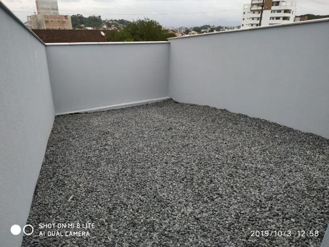 Sobrado geminado com 107 m² no Bairro Iririu - Foto 15
