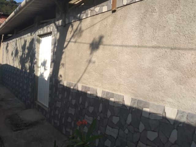 Casa próximo ao centro de Magé - Foto 6