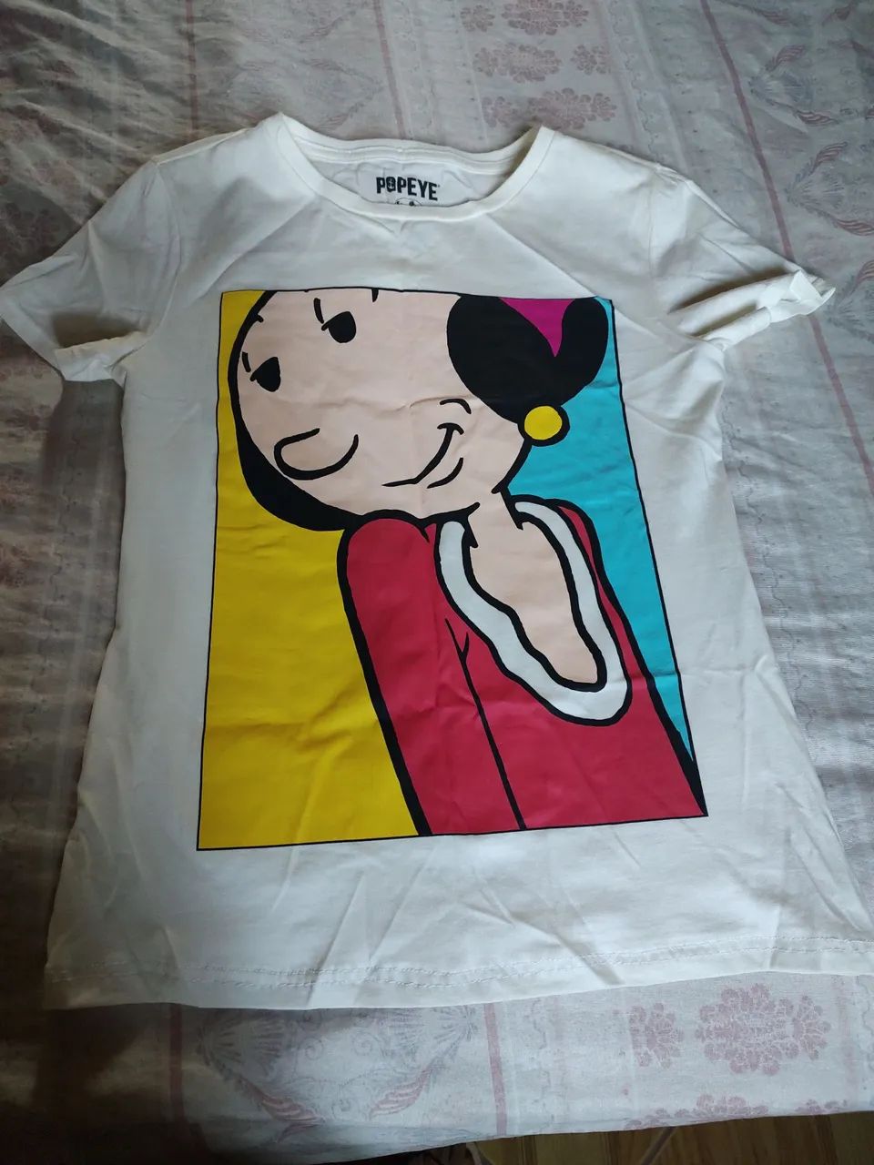 Camiseta branca Olivia Palito.