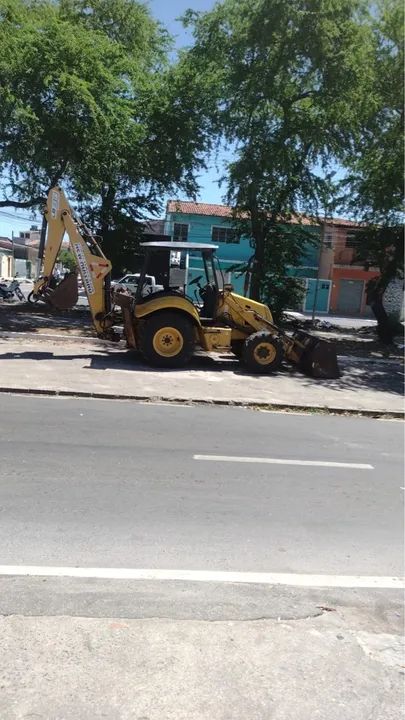 Retroescavadeira new holland lb 90  - Foto 4