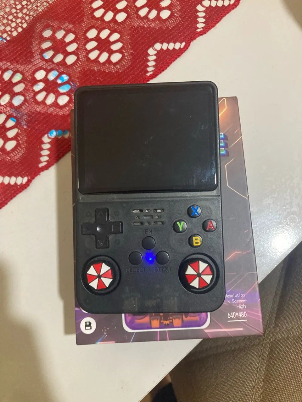 Console r36s com caixa