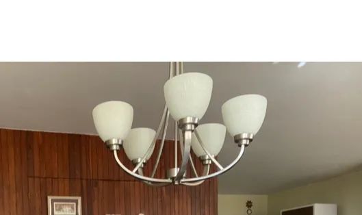 Lustre em aço americano