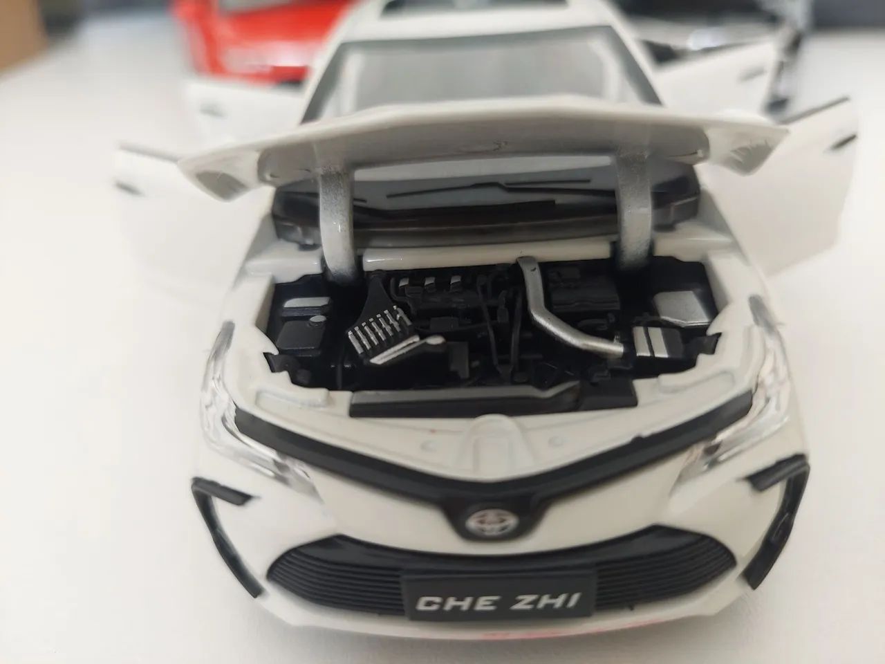 Muniatura Corolla bateria e fricção - Foto 3