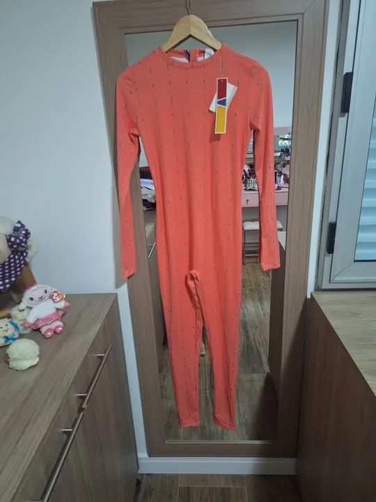 Macacão lycra novo - Reebok- tam p