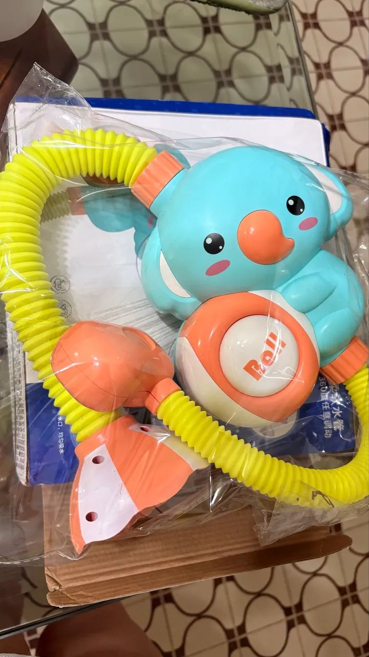 chuveirinho eletrônico infantil para banho - Foto 4