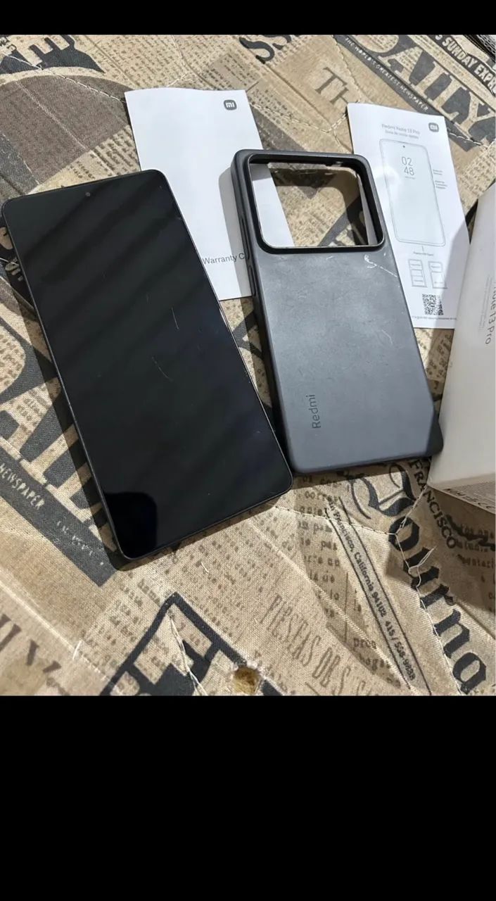 Celular redmi 13 pro trincado mais em bom estado 
