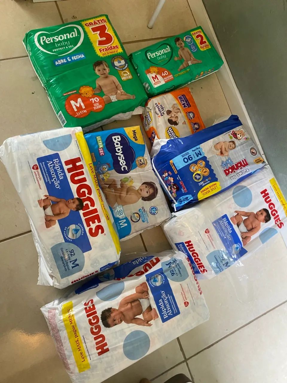 Fraldas tamanho M várias marcas 