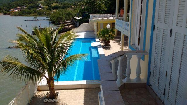 Linda casa na beira mar, pé na água, piscina, lancha, etc,em Florianópolis - Foto 8