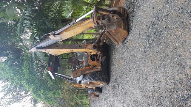 Vendo ou troco retro escavadeira 580L - Foto 2