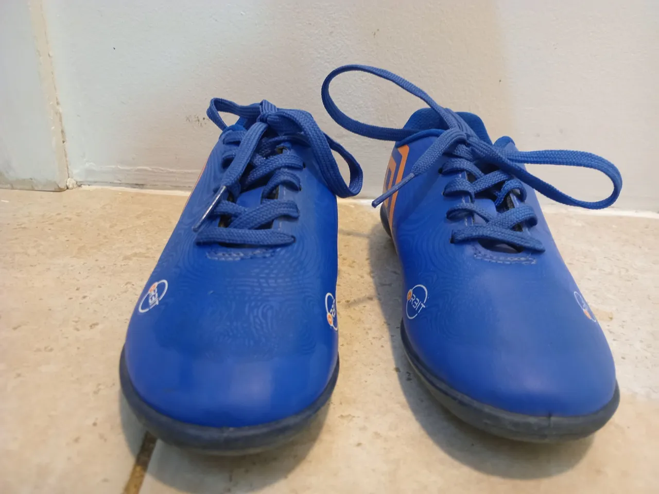 Chuteira infantil azul umbro