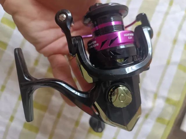 Molinete para pesca serie 2000YLX novo na caixa - Foto 4
