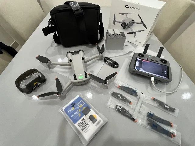 Drone Dji Mini 4 Pro Rc2 Fly More Combo 34m Br Dji043 Cinza - Foto 2