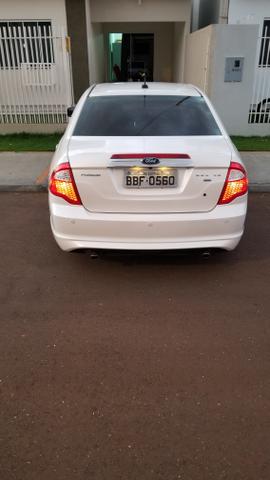 Fusion awd com teto dou de entrada numa casa - Foto 2