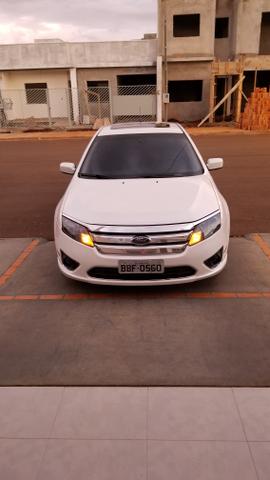 Fusion awd com teto dou de entrada numa casa