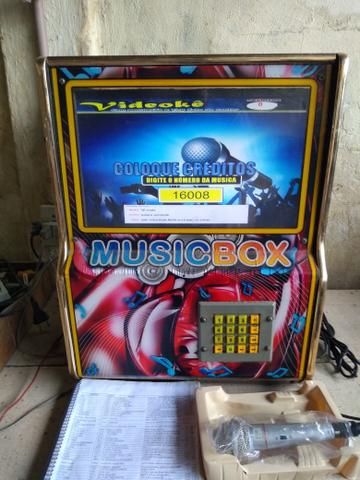 Karaokê c caixa/microfone/catálogo