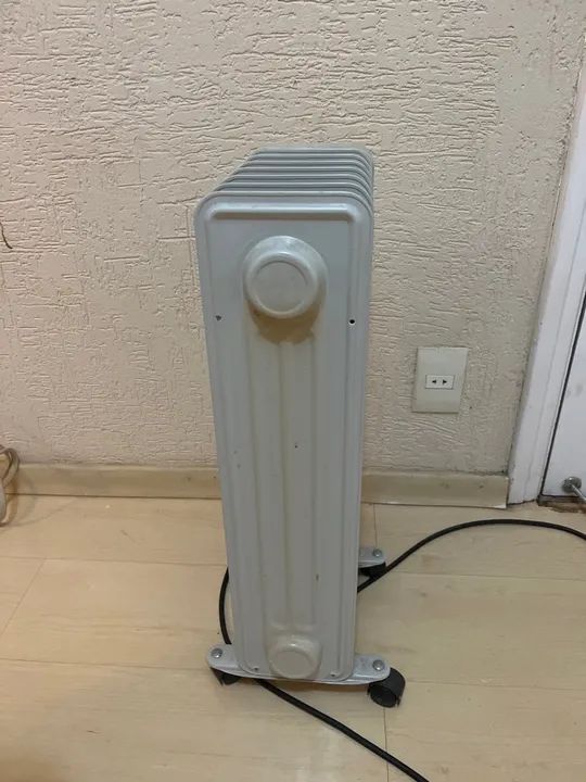 Aquecedor elétrico Britânia AB1500 com óleo  - Foto 4
