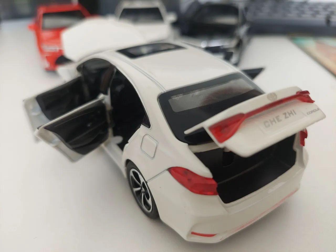 Muniatura Corolla bateria e fricção