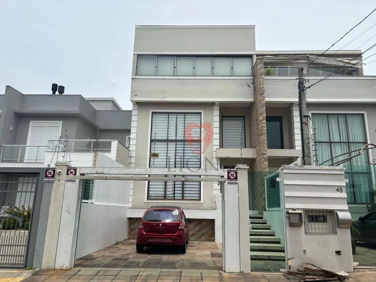 Sobrado com 3 dormitórios à venda, 157 m² por R$ 800.000,00 - Dom Feliciano - Gravataí/RS