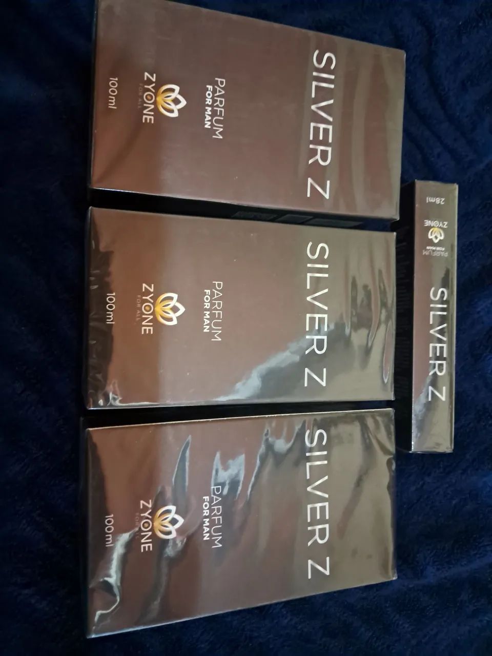 PERFUMES ZYONE.