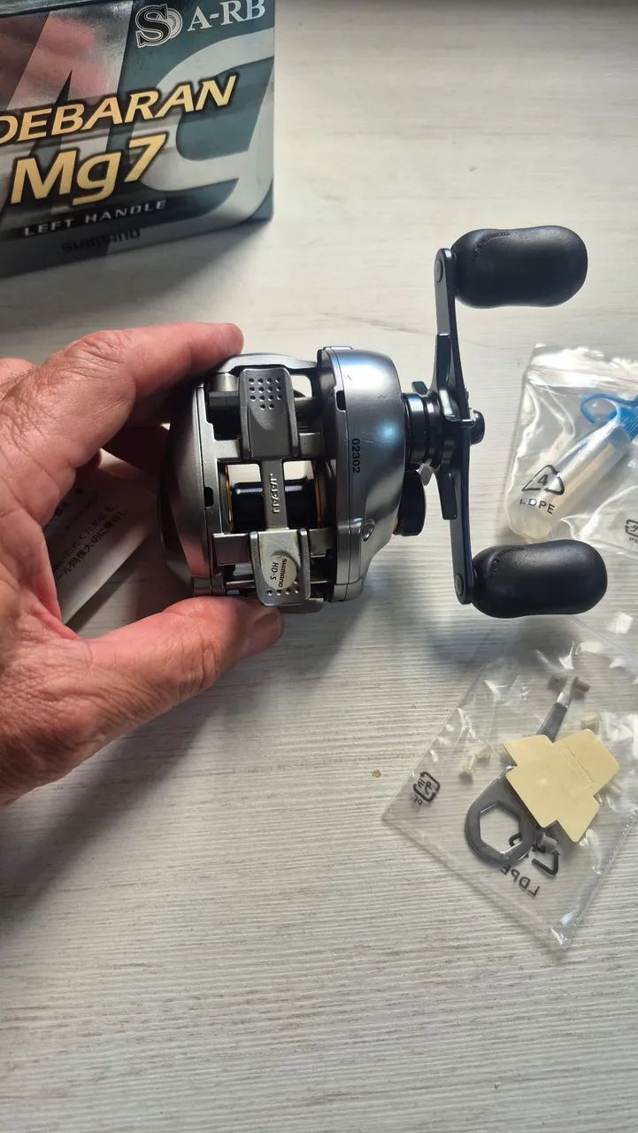 Carretilha shimano Aldebaran mg7 - Hobbies e coleções - Guará II