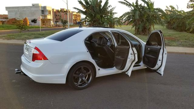Fusion awd com teto dou de entrada numa casa - Foto 9