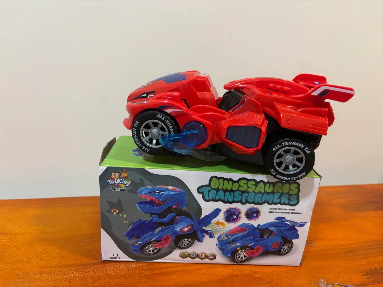 Carrinho Transformers Dinossauro Bate E Volta Sons NOVO - Foto 2