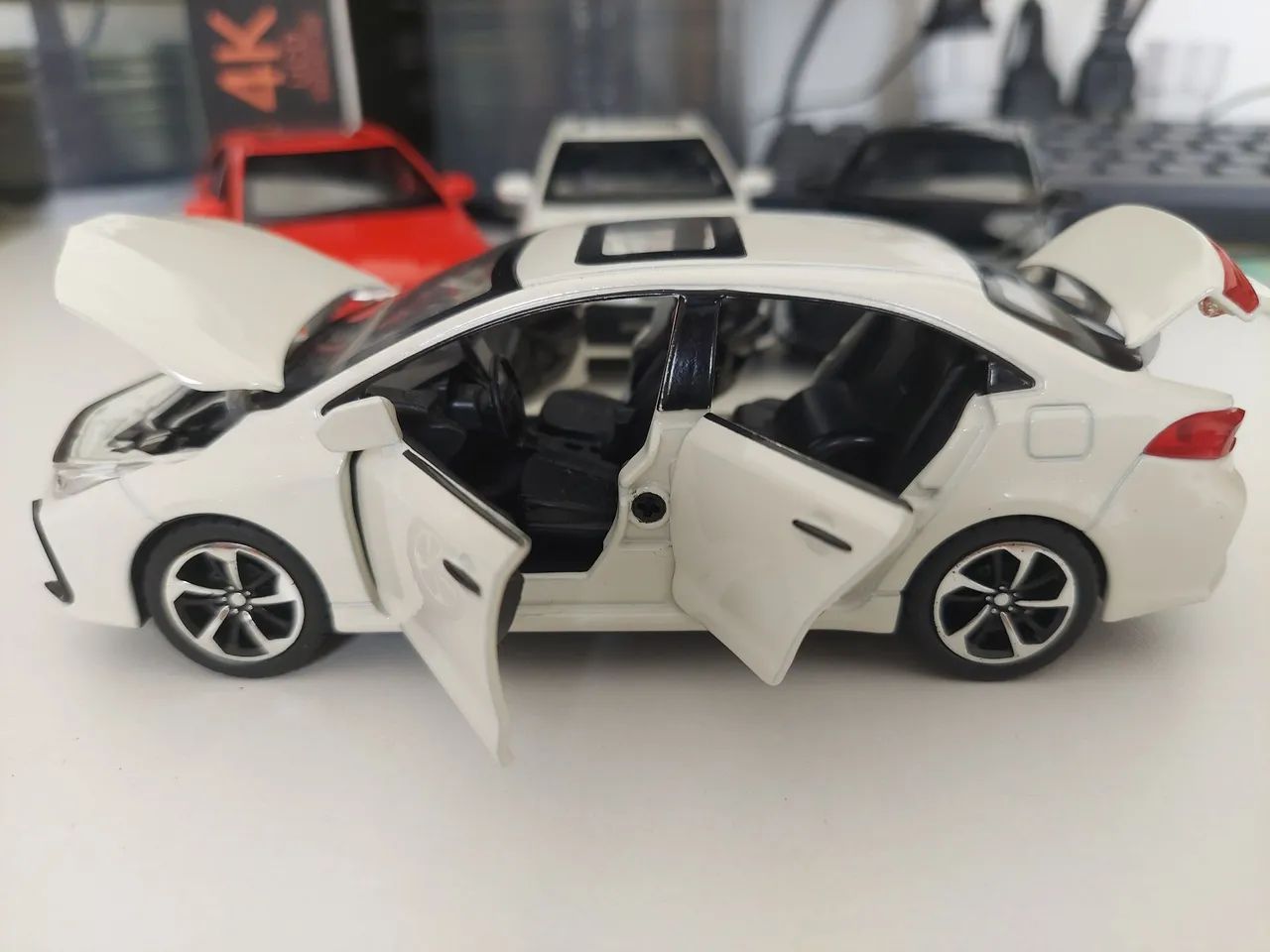 Muniatura Corolla bateria e fricção - Foto 2