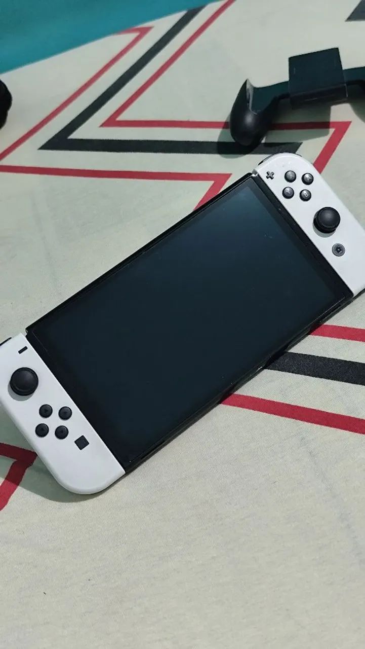 Nitendo switch OLED com tudo original + jogos e etc  - Foto 2