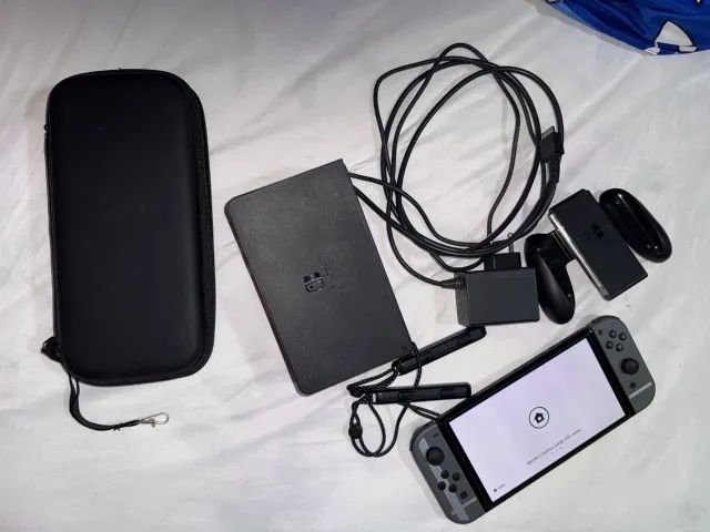 Nintendo Switch OLED 64GB com case, pouco usado - Foto 2