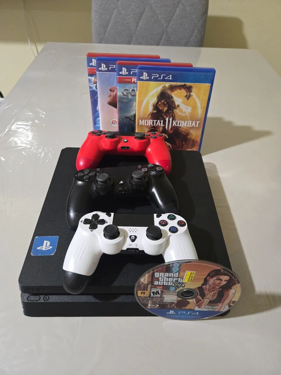 Ver descrição PS4 Slim 1T + 3 controles e Jogos - Uso pessoal - Não revenda(marcas de uso)