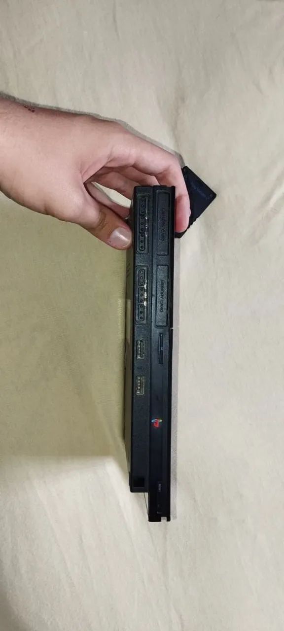 PS2 - Com chipset matrix original e leitor de disco em perfeito estado. - Foto 2