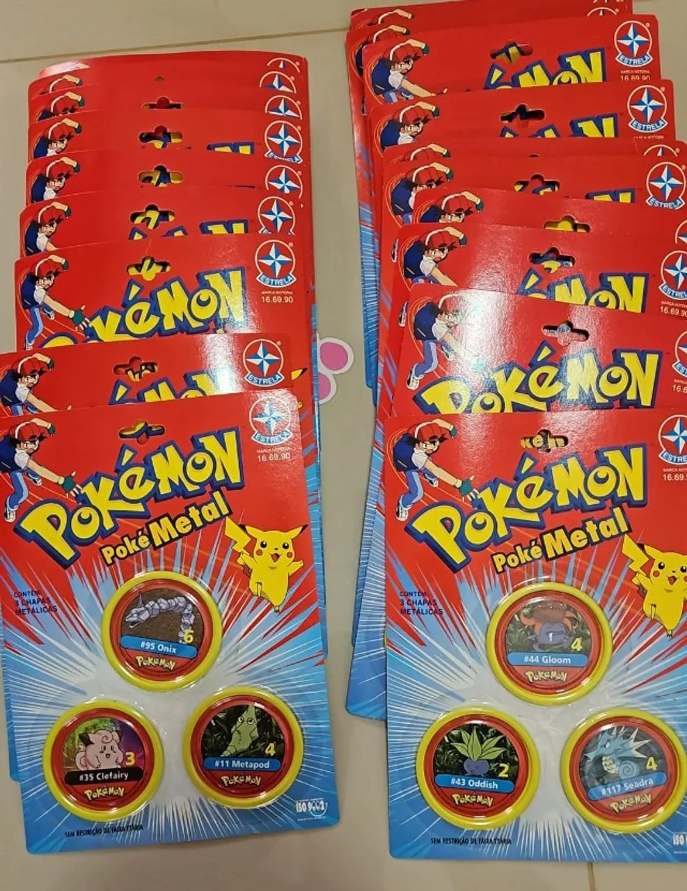 Lote com 41 cartelas lacradas PokéMetal Estrela - Foto 2
