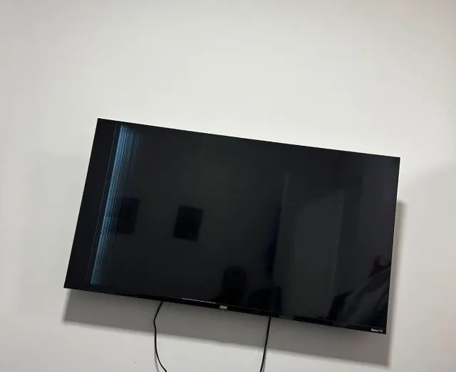 Televisão 42 polegadas AOC, com defeito na tela