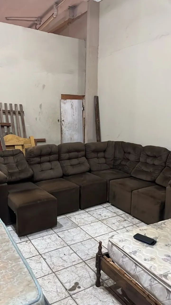 Sofá em L retrátil 