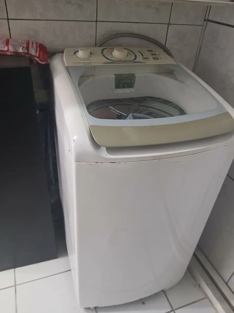 Máquina de lavar com defeito 