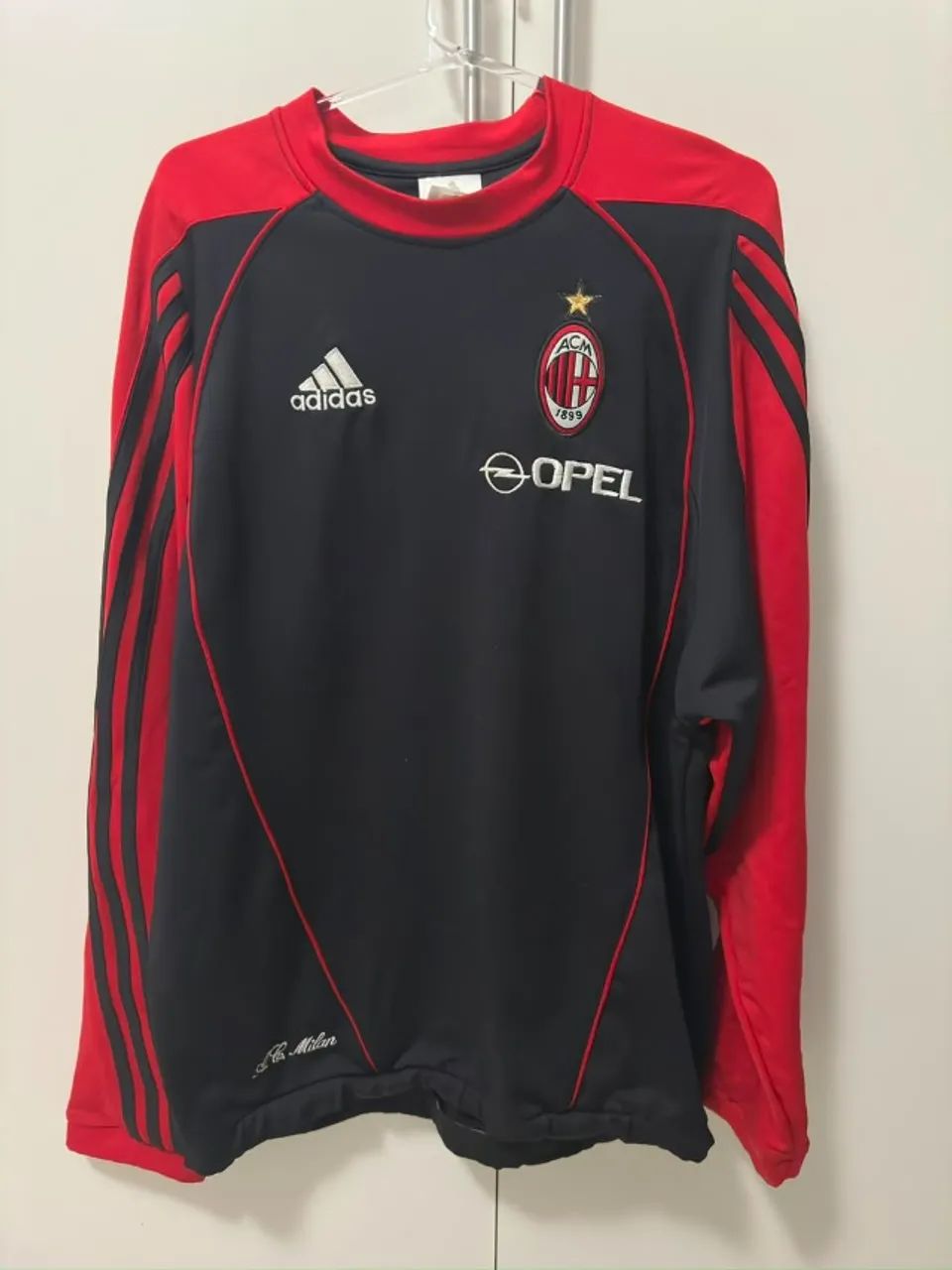 Agasalho Milan Opel 04/05