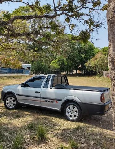 Carro Volkswagen Saveiro G4 Surf (Rebaixada com som/moto na capota