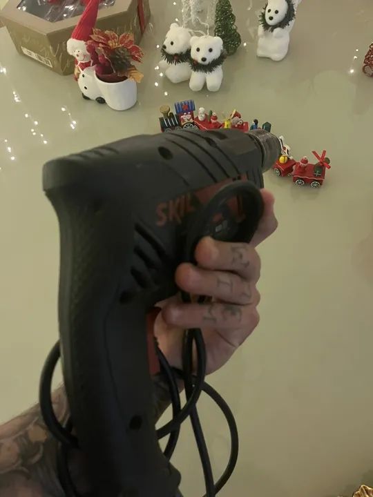 Furadeira de impacto Skil 550W 127V - Foto 3