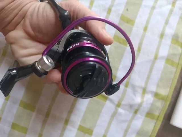 Molinete para pesca serie 2000YLX novo na caixa - Foto 5