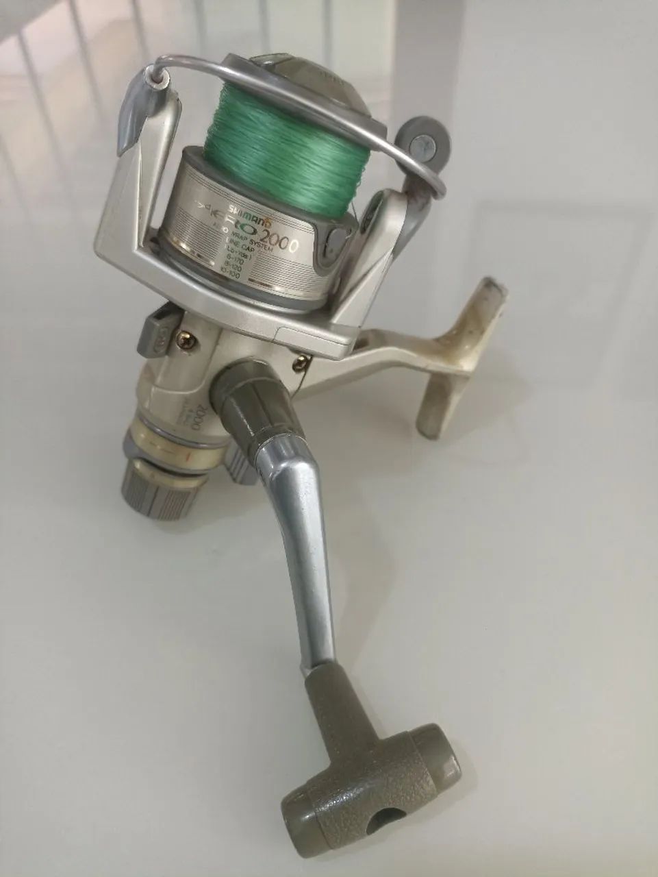 Molinete Shimano Aero 2000 Japão  - Foto 6
